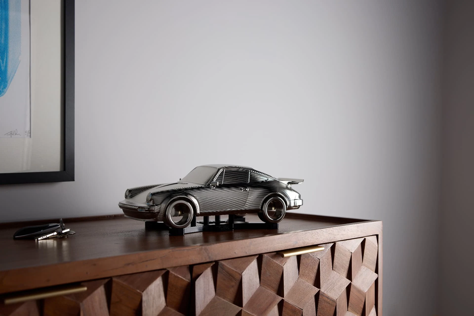 C01 Tailwind — displayed on a sideboard, shown in scale