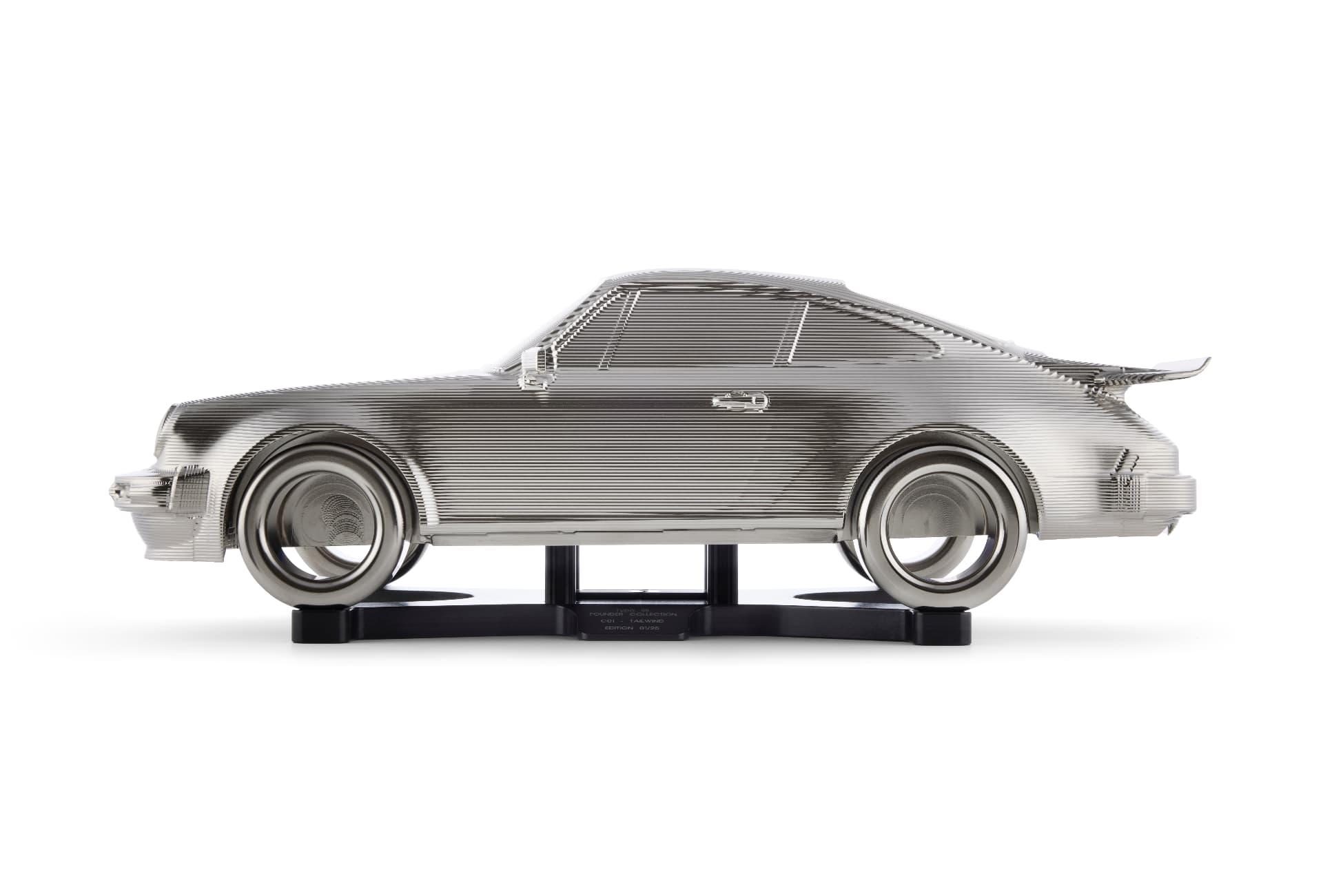 Finished machined aluminium model on its display stand