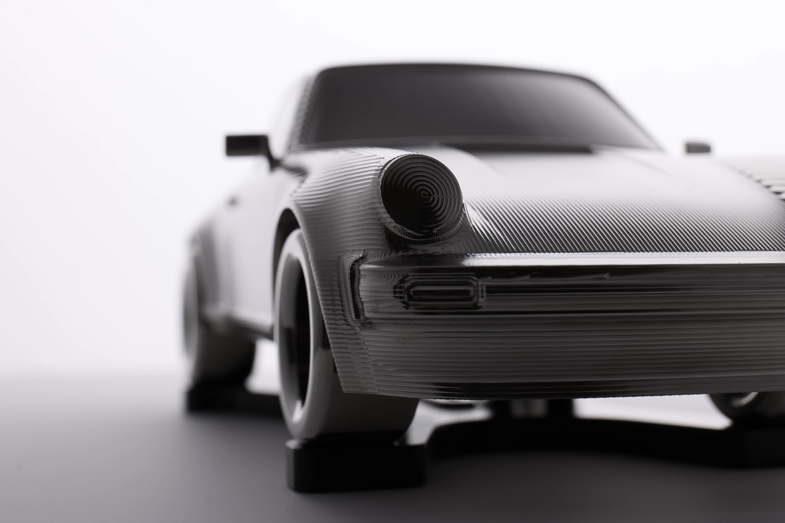 C01 Tailwind — billet-machined front three-quarter study